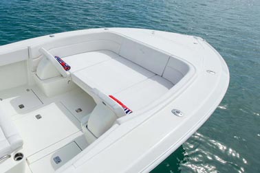 Lower the backrests and electronically deploy the center insert to create a sun pad.